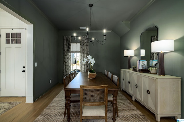 1313 Severn Way, Hoover, AL 35244 - dining room featuring crown molding, wood finished floors, and a chandelier