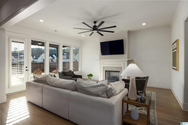 1313 Severn Way, Hoover, AL 35244 - living room with a fireplace, wood finished floors, recessed lighting, ceiling fan, and ornamental molding