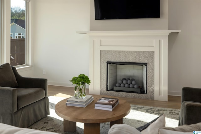 1313 Severn Way, Hoover, AL 35244 - living area with wood finished floors and a tiled fireplace