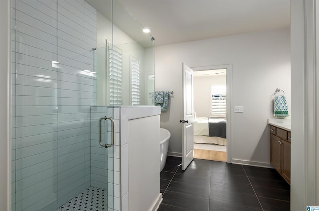 1313 Severn Way, Hoover, AL 35244 - bathroom with vanity, a shower stall, tile patterned floors, and connected bathroom