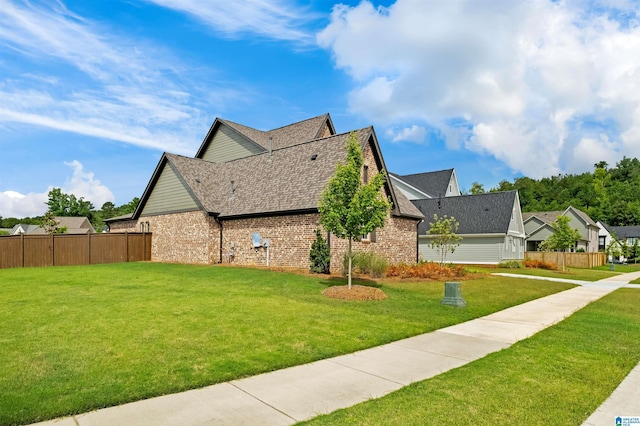 1313 Severn Way, Hoover, AL 35244 - view of property exterior featuring brick siding and roof with shingles