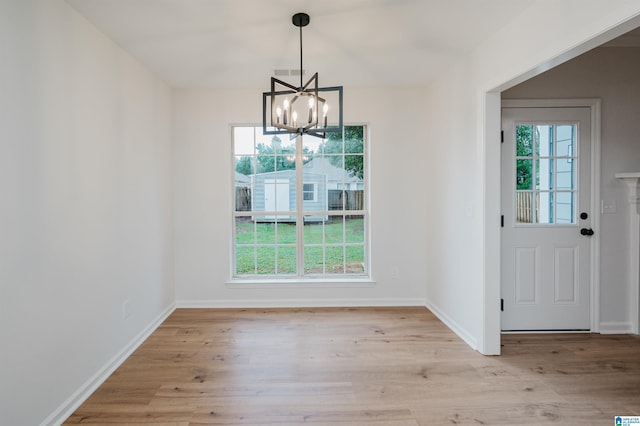 4022 Cambridge Dr, Moody, AL 35004 - unfurnished dining area with a chandelier and light wood-type flooring