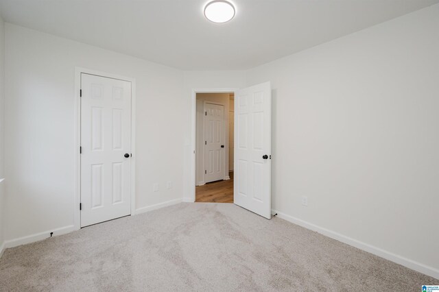 4022 Cambridge Dr, Moody, AL 35004 - unfurnished bedroom with carpet and baseboards