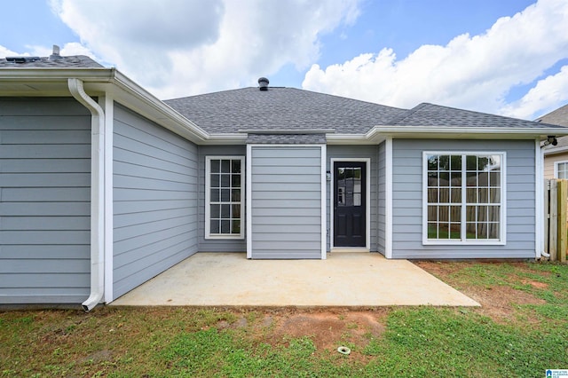 4022 Cambridge Dr, Moody, AL 35004 - back of property featuring a patio area, a shingled roof, and a lawn