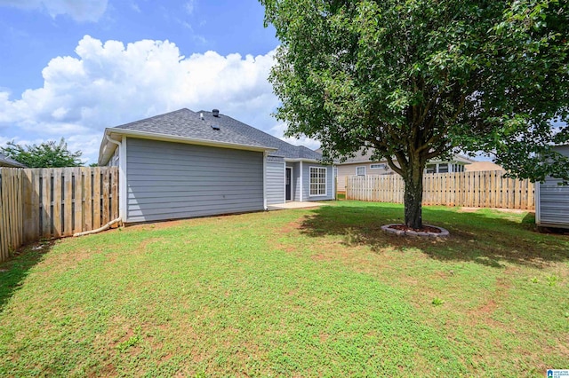 4022 Cambridge Dr, Moody, AL 35004 - back of house with a fenced backyard and a shingled roof
