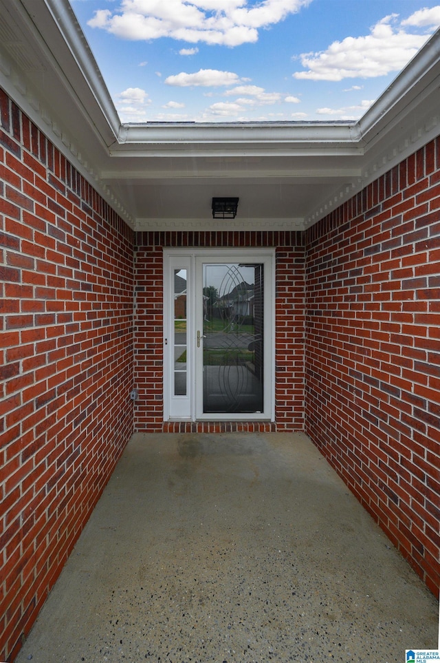 4022 Cambridge Dr, Moody, AL 35004 - view of exterior entry with brick siding and a patio