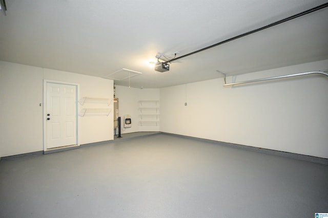 4022 Cambridge Dr, Moody, AL 35004 - garage with a garage door opener and water heater