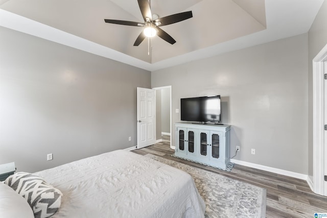 4114 Jubilee Ln, Moody, AL 35004 - bedroom featuring wood finished floors, a raised ceiling, and ceiling fan