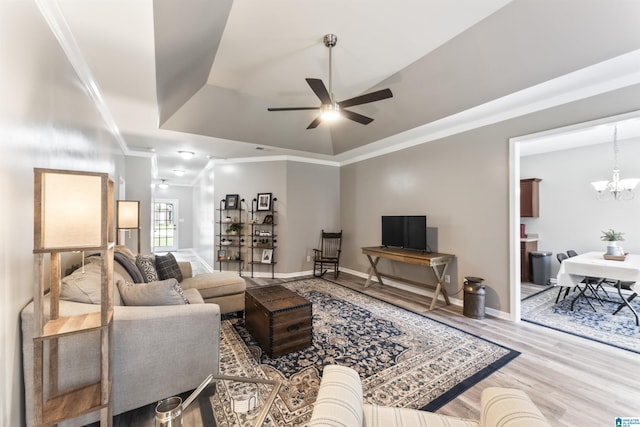 4114 Jubilee Ln, Moody, AL 35004 - living room with a ceiling fan, crown molding, wood finished floors, a chandelier, and a raised ceiling