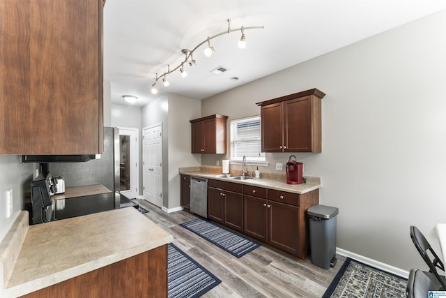 4114 Jubilee Ln, Moody, AL 35004 - kitchen featuring light wood-style floors, black range with electric cooktop, light countertops, and stainless steel dishwasher
