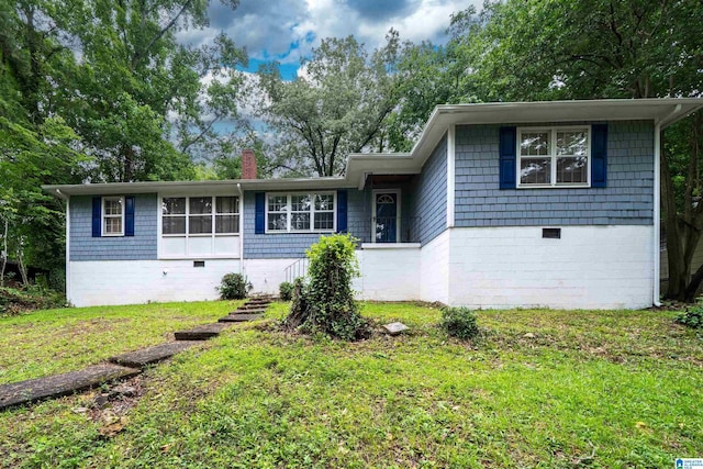805 Vanderbilt St, Birmingham, AL 35206 - tri-level home featuring crawl space, a chimney, and a front yard