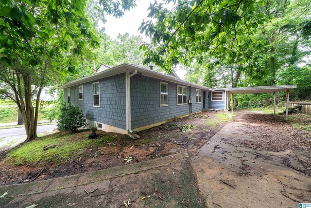 805 Vanderbilt St, Birmingham, AL 35206 - view of side of property with driveway and a carport