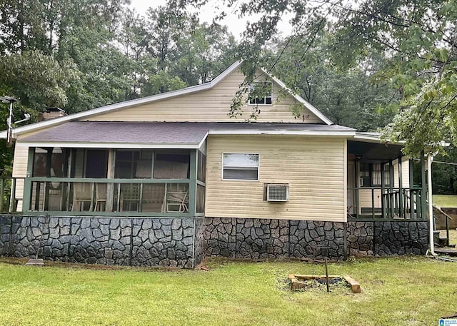 11201 Woodland Dr, Mccalla, AL 35111 - view of side of property with a yard, a sunroom, and a porch