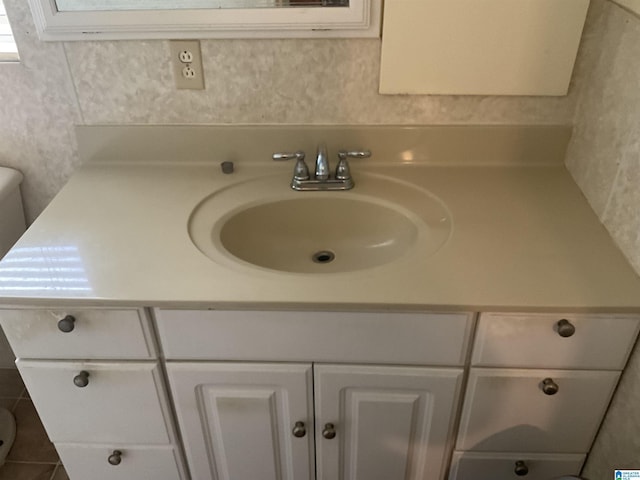 11201 Woodland Dr, Mccalla, AL 35111 - bathroom with vanity and tile patterned floors