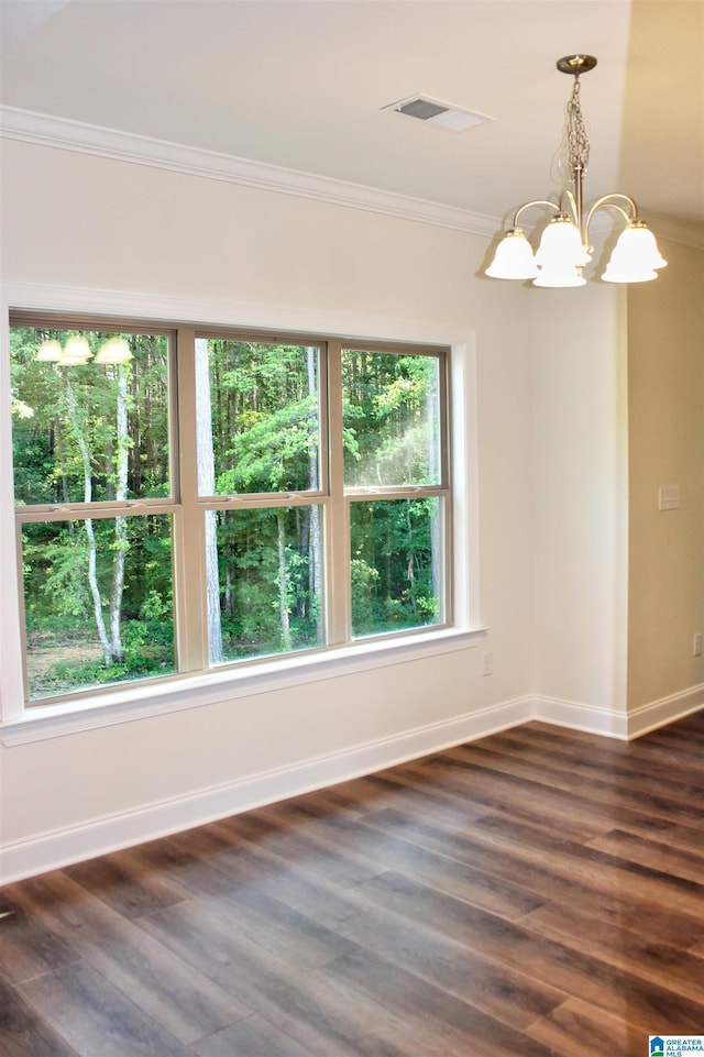 1029 Creel Dr, Moody, AL 35004 - unfurnished room with crown molding, a chandelier, and dark wood-style floors