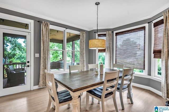 5012 Lake Crest Cir, Hoover, AL 35226 - dining space with light wood-style flooring and ornamental molding