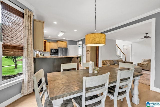 5012 Lake Crest Cir, Hoover, AL 35226 - dining area with crown molding, recessed lighting, ceiling fan, light wood-type flooring, and stairs