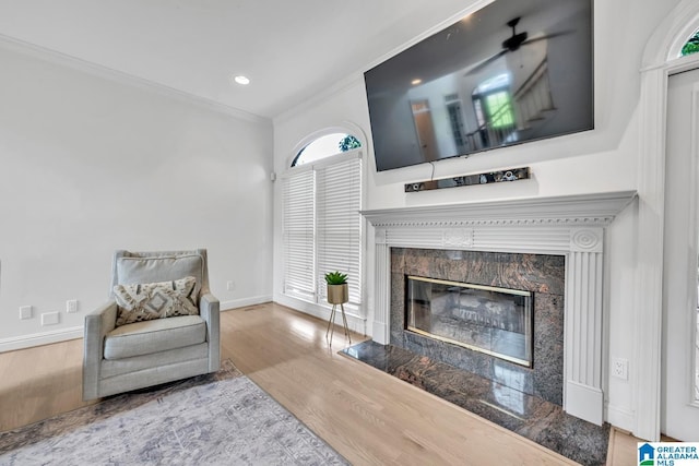 5012 Lake Crest Cir, Hoover, AL 35226 - living room with crown molding, wood finished floors, a premium fireplace, and recessed lighting
