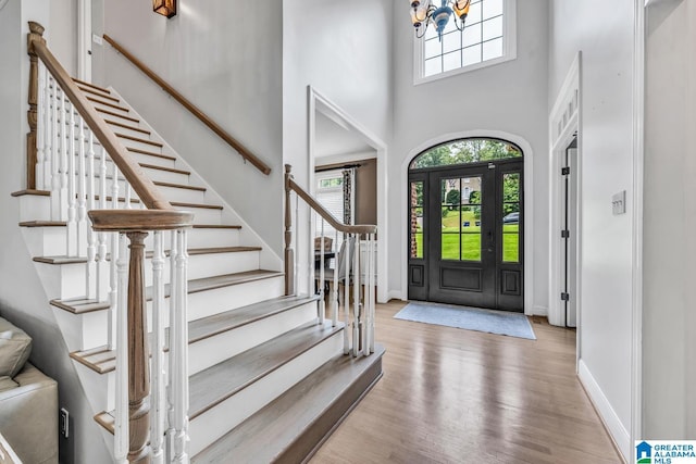 5012 Lake Crest Cir, Hoover, AL 35226 - entryway with wood finished floors, a high ceiling, and stairs