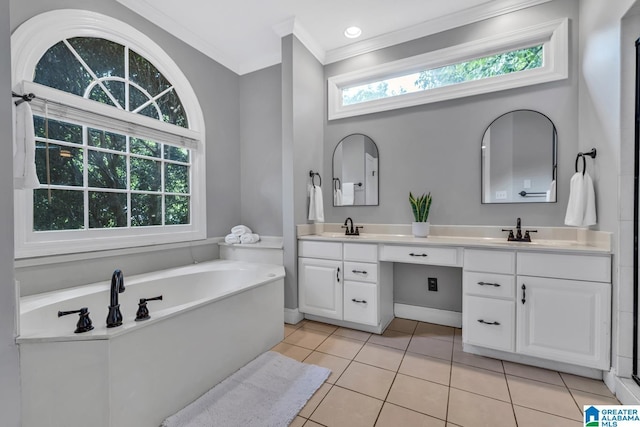 5012 Lake Crest Cir, Hoover, AL 35226 - bathroom with double vanity, crown molding, healthy amount of natural light, tile patterned flooring, and a bath