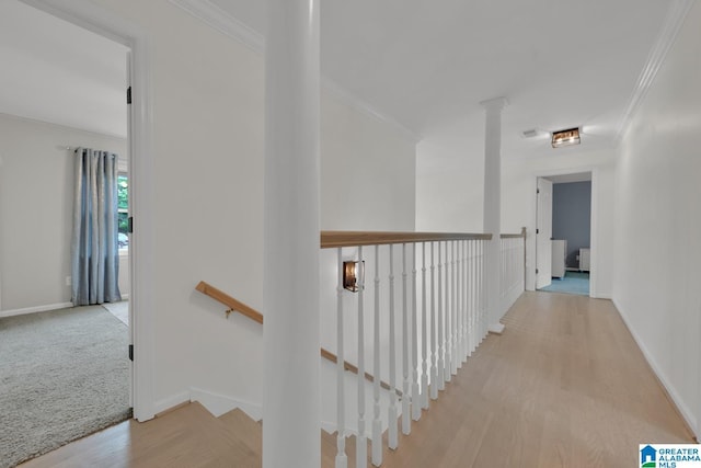 5012 Lake Crest Cir, Hoover, AL 35226 - hall with an upstairs landing, ornamental molding, and wood finished floors