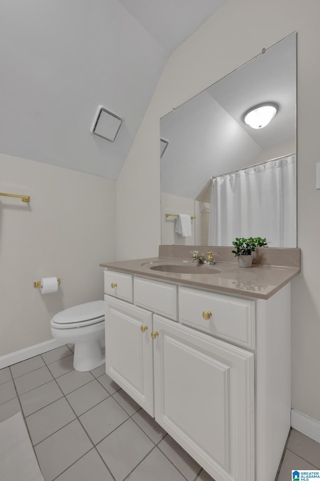 5012 Lake Crest Cir, Hoover, AL 35226 - bathroom with vaulted ceiling, vanity, tile patterned floors, and a shower with curtain