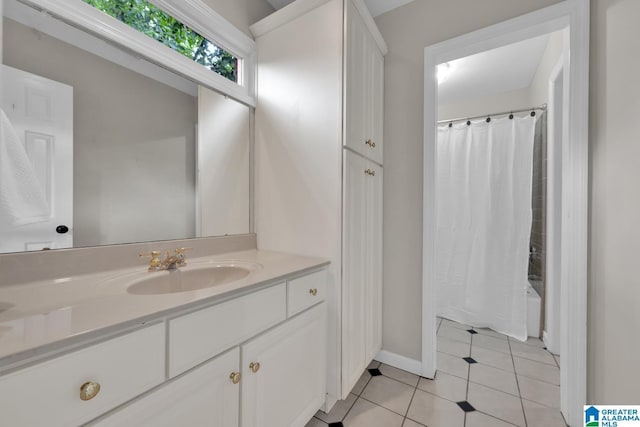 5012 Lake Crest Cir, Hoover, AL 35226 - full bath featuring vanity, tile patterned floors, and shower / bathtub combination with curtain