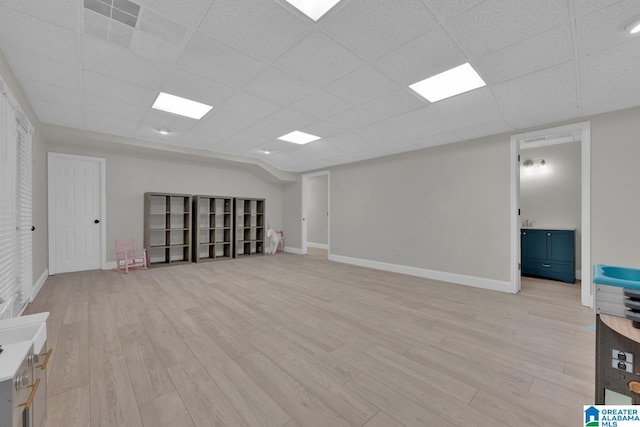 5012 Lake Crest Cir, Hoover, AL 35226 - basement featuring a paneled ceiling and light wood finished floors