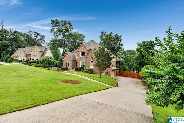 5012 Lake Crest Cir, Hoover, AL 35226 - traditional-style house with concrete driveway, brick siding, and an attached garage