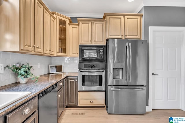5012 Lake Crest Cir, Hoover, AL 35226 - kitchen featuring stainless steel appliances, ornamental molding, glass insert cabinets, stone countertops, and light wood finished floors