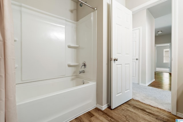 240 Hillcrest Dr, Montevallo, AL 35115 - full bath with shower / bath combo with shower curtain and wood finished floors