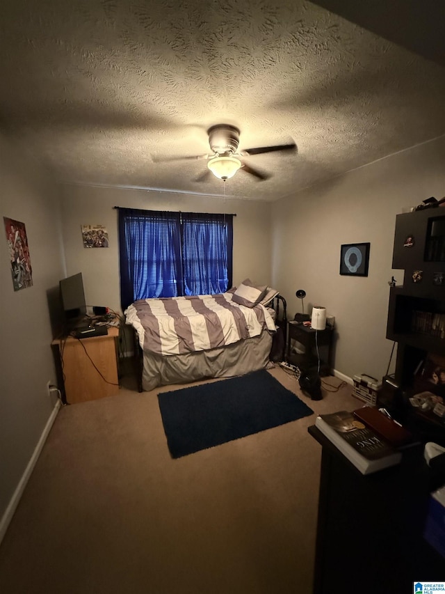 1500 Rockview Cir, Weaver, AL 36277 - carpeted bedroom featuring a textured ceiling and ceiling fan