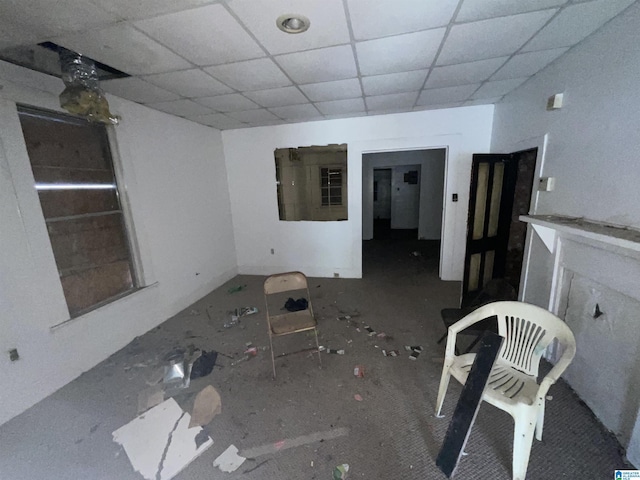 4704 9th Ave, Birmingham, AL 35224 - unfurnished living room featuring a drop ceiling