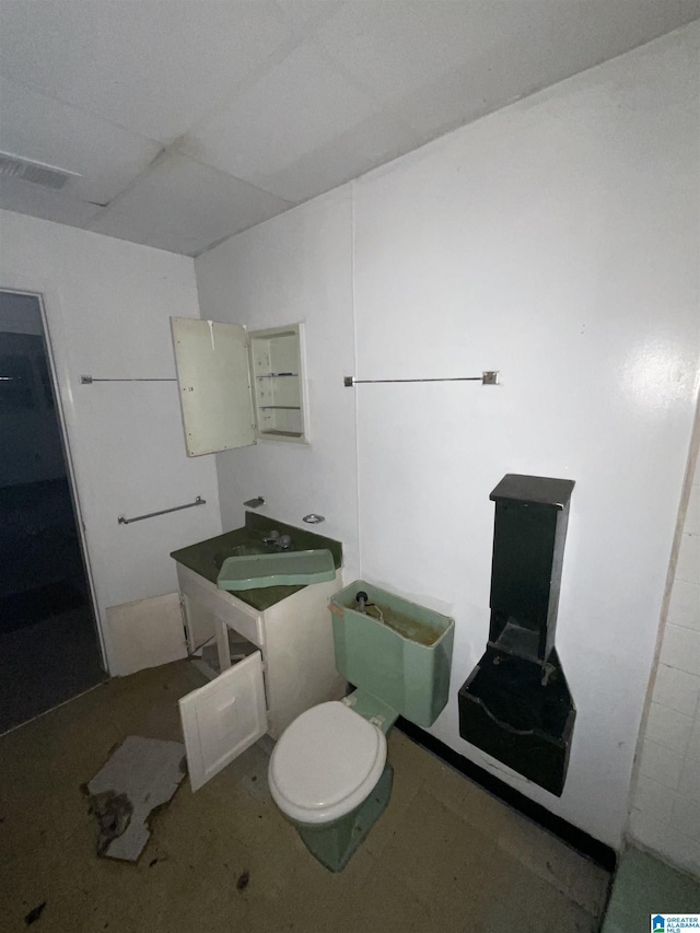 4704 9th Ave, Birmingham, AL 35224 - bathroom featuring toilet and a sink
