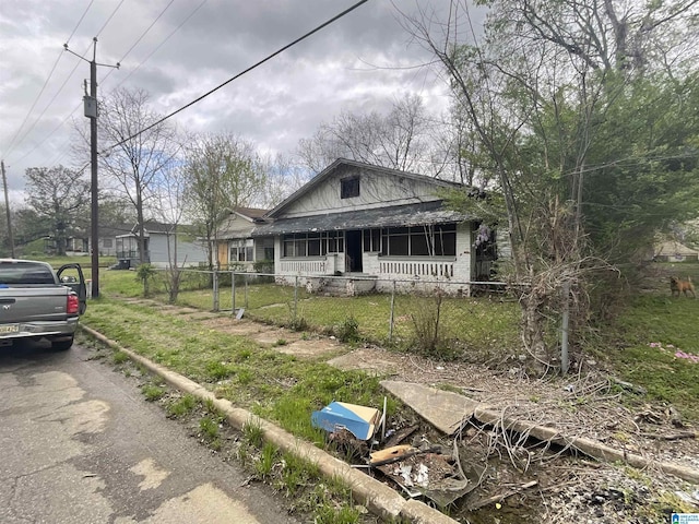 4704 9th Ave, Birmingham, AL 35224 - bungalow-style house with covered porch and a fenced front yard