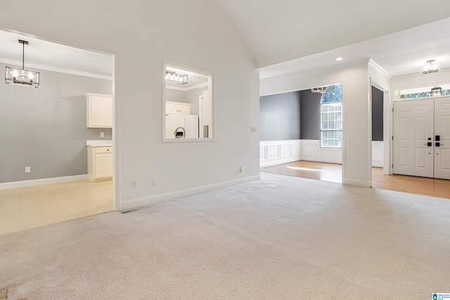 148 Grande View Ln, Alabaster, AL 35114 - unfurnished living room with light carpet, ornamental molding, plenty of natural light, a chandelier, and recessed lighting