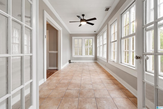 1701 S 16th Ave, Birmingham, AL 35205 - unfurnished sunroom with crown molding and tile patterned flooring