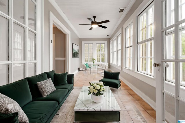 1701 S 16th Ave, Birmingham, AL 35205 - sunroom featuring tile patterned floors, ornamental molding, and french doors