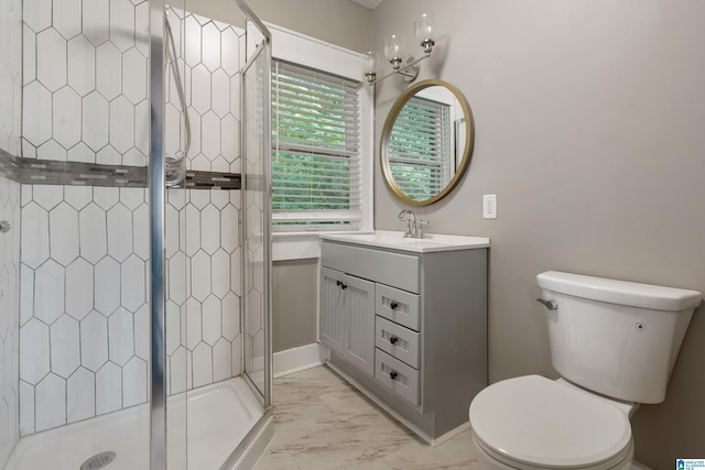 1701 S 16th Ave, Birmingham, AL 35205 - bathroom featuring marble look tiles, vanity, and a stall shower