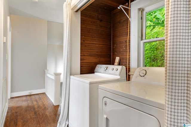 1701 S 16th Ave, Birmingham, AL 35205 - laundry area with washing machine and clothes dryer, wood walls, and dark wood finished floors