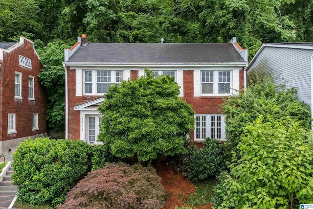 1701 S 16th Ave, Birmingham, AL 35205 - colonial inspired home featuring brick siding and a chimney