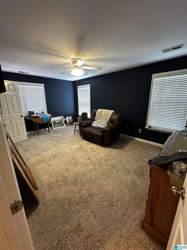 76 Goggins Dr, Montevallo, AL 35115 - living room featuring carpet floors, a ceiling fan, and plenty of natural light