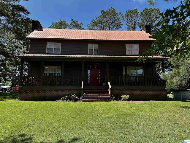 76 Goggins Dr, Montevallo, AL 35115 - view of front of property with a porch, a chimney, and a front lawn