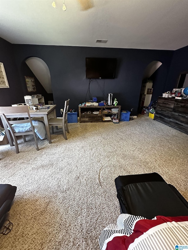 76 Goggins Dr, Montevallo, AL 35115 - carpeted living room featuring arched walkways