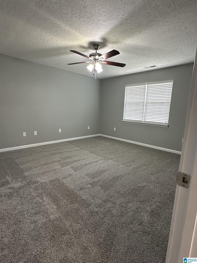 426 Bailey Rd, Weaver, AL 36277 - empty room with ceiling fan, a textured ceiling, and carpet