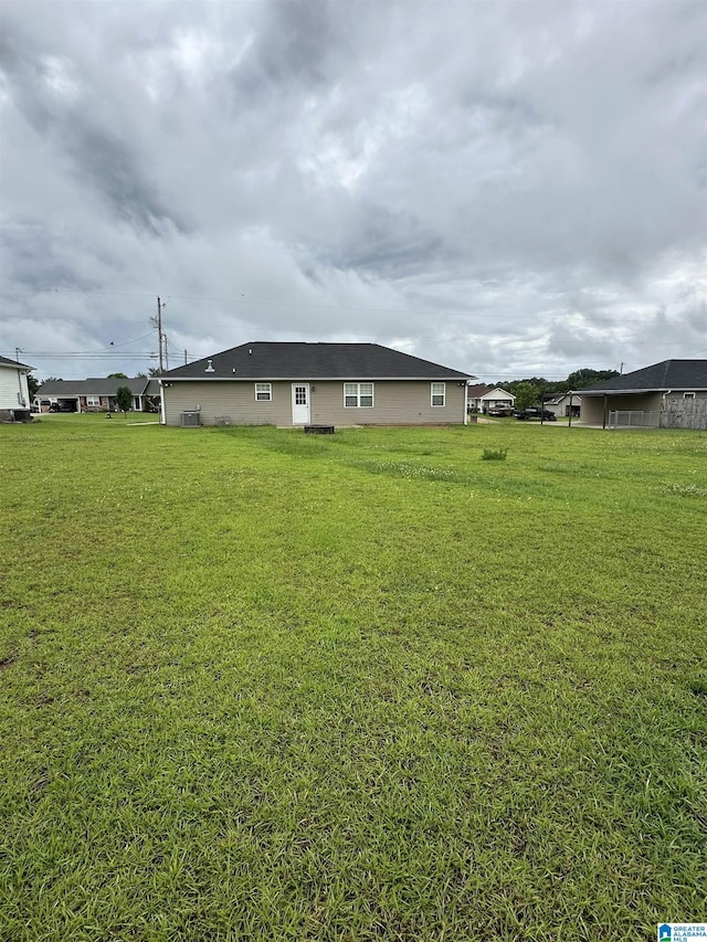 426 Bailey Rd, Weaver, AL 36277 - back of property with a lawn