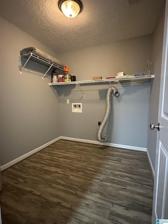 426 Bailey Rd, Weaver, AL 36277 - laundry area featuring washer hookup, wood finished floors, and a textured ceiling