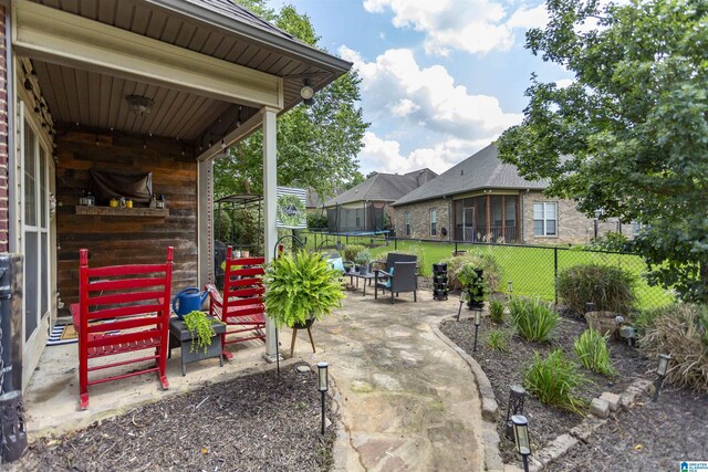 1120 Weybridge Way, Pelham, AL 35124 - view of patio / terrace with a trampoline