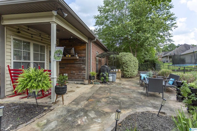 1120 Weybridge Way, Pelham, AL 35124 - view of patio featuring a trampoline and area for grilling