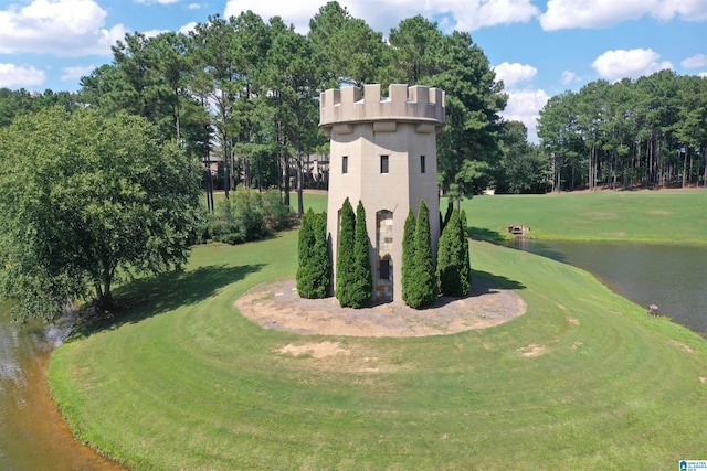 1120 Weybridge Way, Pelham, AL 35124 - view of home's exterior with a water view, a yard, and view of wooded area